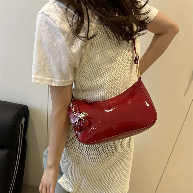 kf-S3f94365e0bd84ba79a4ce63feec3870b5 Fashion Retro PU Black Shoulder Crossbody Bag Crescent Bag Classic Cherry Pendant Design Women Armpit Bag Girls Festival Gifts - Image 1